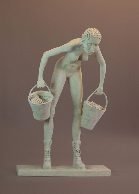 sculpture of woman carrying buckets